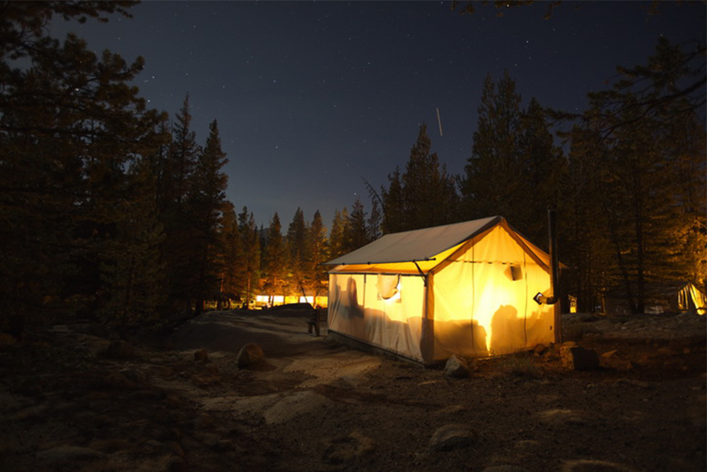 Tent cabins under a starry Yosemite sky