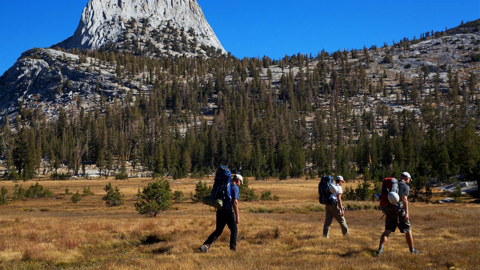 Climbers approaching Cathedral Peak
